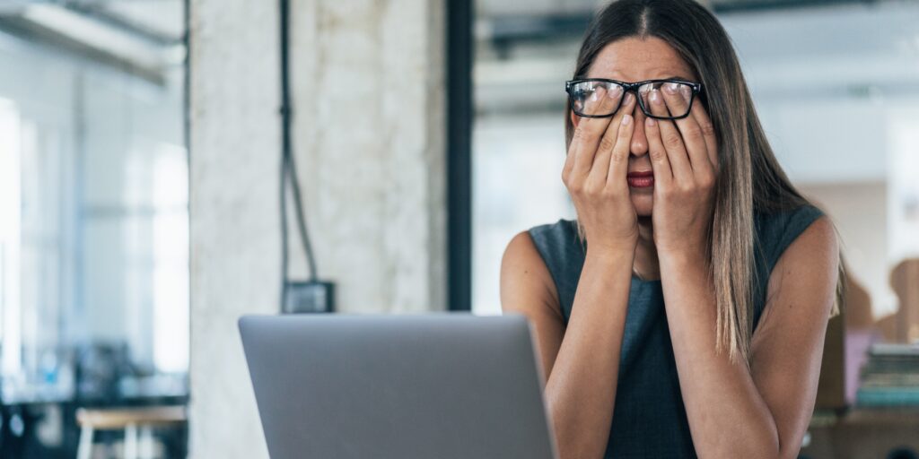 woman stressed at work Late Diagnosis ADHD